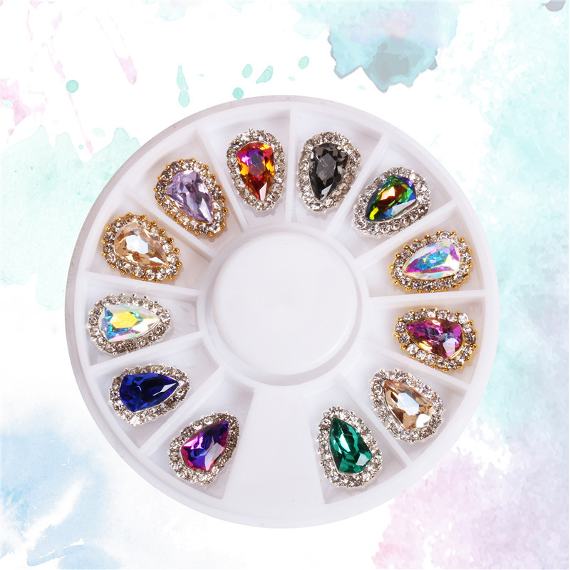 Joyería de uñas de lujo exclusiva transfronteriza al por mayor de aleación de escudo mágico colorido diamante joyería de uñas grande placa giratoria