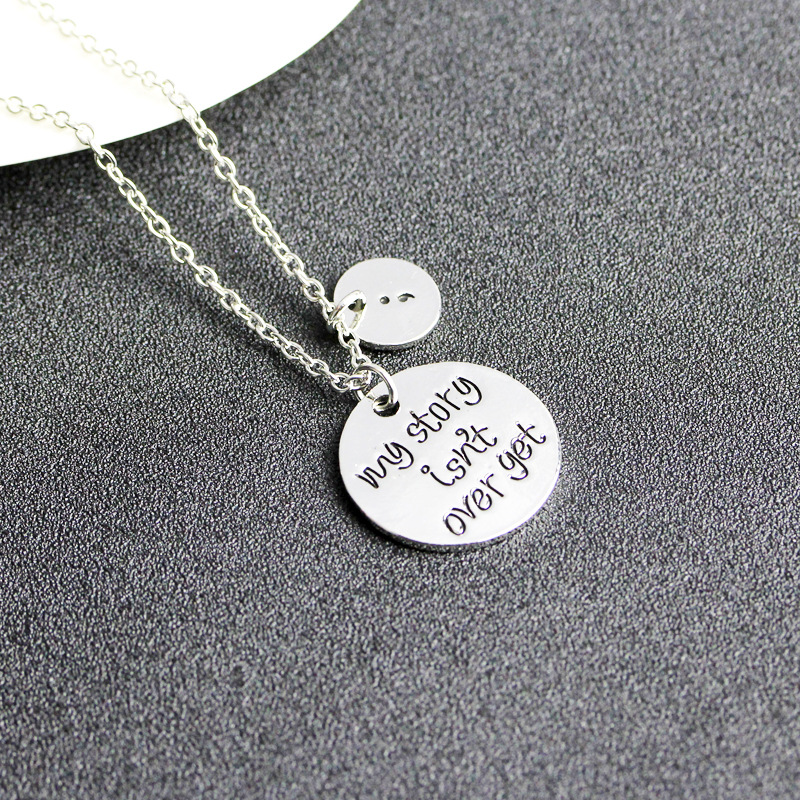 New Fashion Geometric Round Tag Necklace English My Story Isn&#39;t Over Yet Necklace Wholesale display picture 4