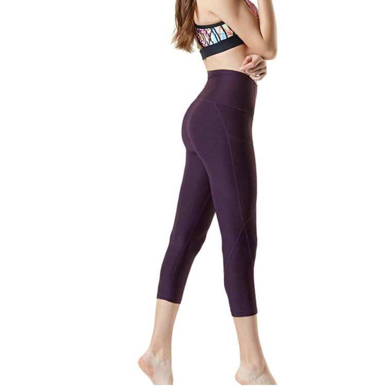 Women's yoga Pants abdominal side stitching sports running elastic solid color yoga pants Z7013 pocket 8-point pants_voghion.com