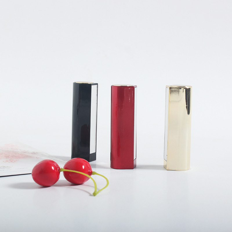 En stock tubo de lápiz labial al por mayor con espejo suministro de plástico 12,1 calibre primavera oro negro rojo paquete de maquillaje lápiz labial tubo vacío