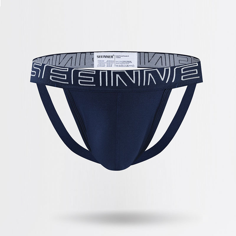 Ropa interior sexy de algodón para hombre, tanga de cintura baja de color liso, doble, para comercio exterior.