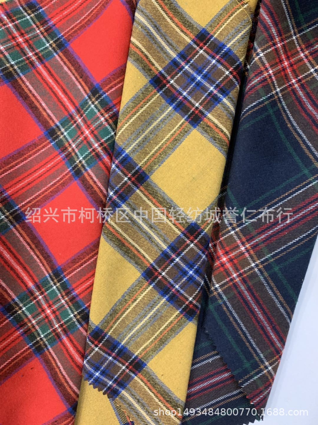 厂家直销现货供应21支色织涤棉混纺格子布 斜纹单面法兰绒磨毛