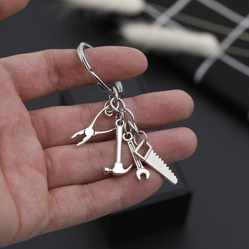 Explosion Keychain Personality Father's Day Gift Tool Four-piece Metal Keychain Pendant Jewelry Wholesale Nihaojewelry display picture 2