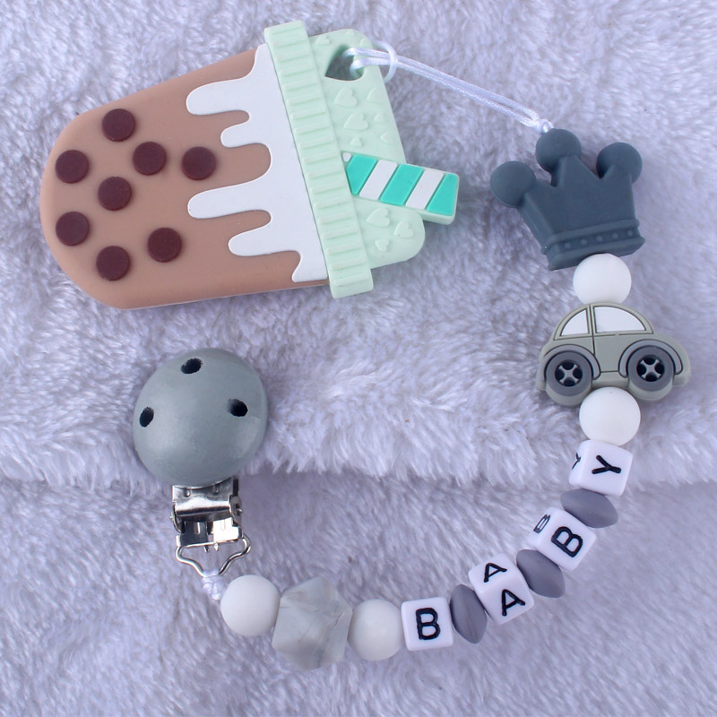 Patrón de dibujos animados de bebé de silicona chupete Cadena de dientes de bebé Cadena de molienda chupete cadena anti-caída comercio exterior