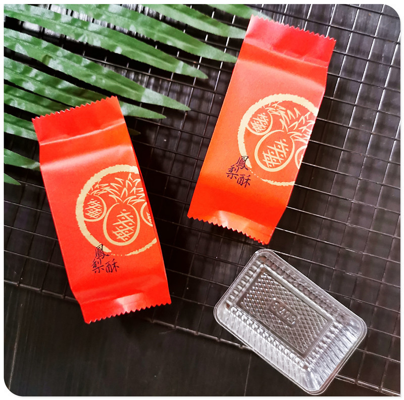 Nueva bolsa de embalaje crujiente de piña engrosada piña roja caja de embalaje crujiente Año Nuevo algodón festivo sello de la máquina de papel