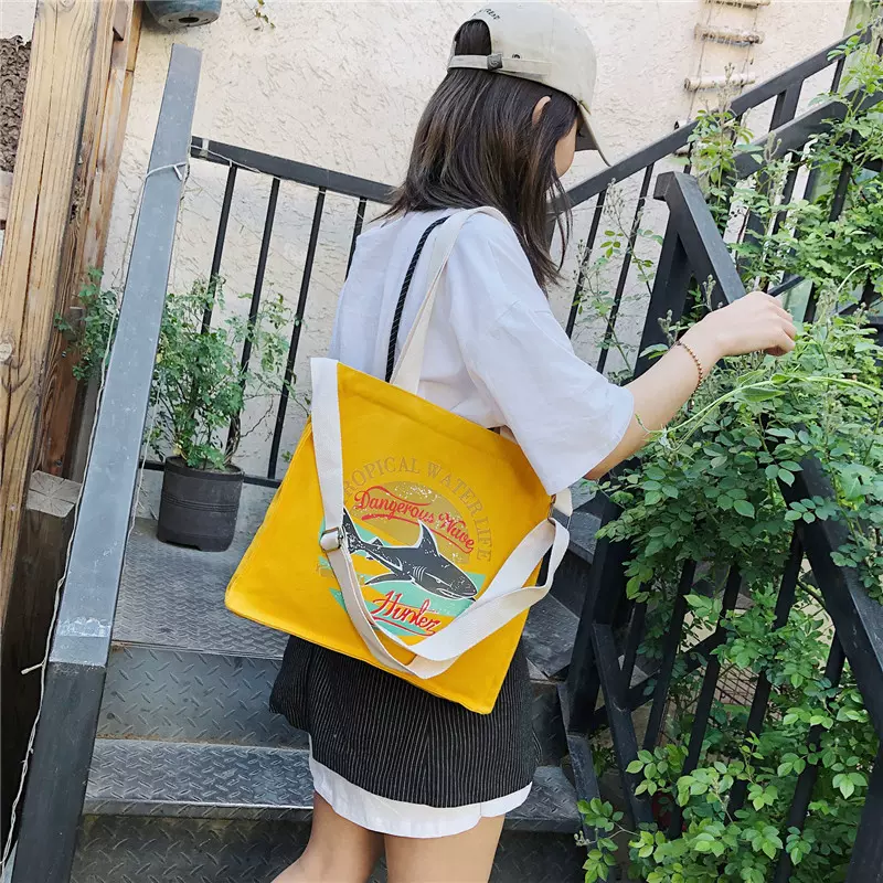 印花款单肩斜跨原宿风帆布包包女2021新款大容量女包斜挎通勤包