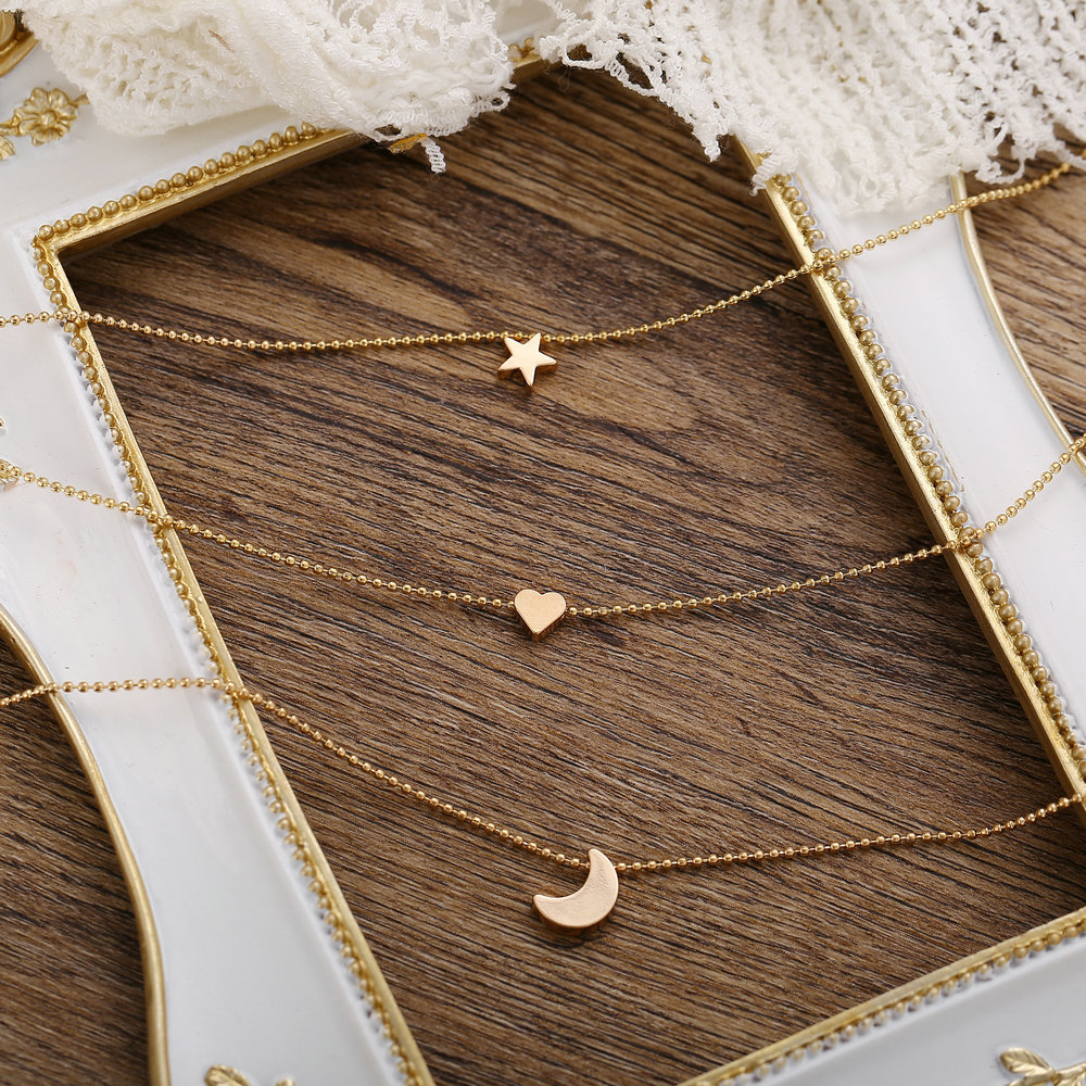 New Golden Pendant Clavicle Chain Creative Retro Simple Star Moon Love Pendant Necklace Wholesale Nihaojewelry display picture 6