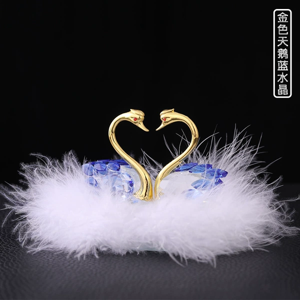 Golden swan + blue crystal + feathers
