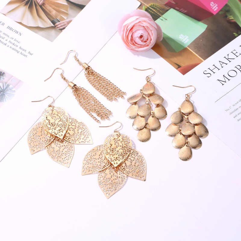 Fashion Hollow Leaves Simple Pearl Tassel Earrings Set display picture 3