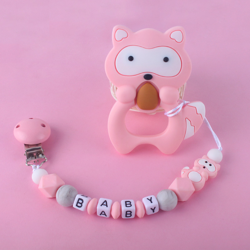 Teether chupete cadena bebé chupete de silicona clip Amazon Comercio exterior teether traje nuevo mapache la historieta