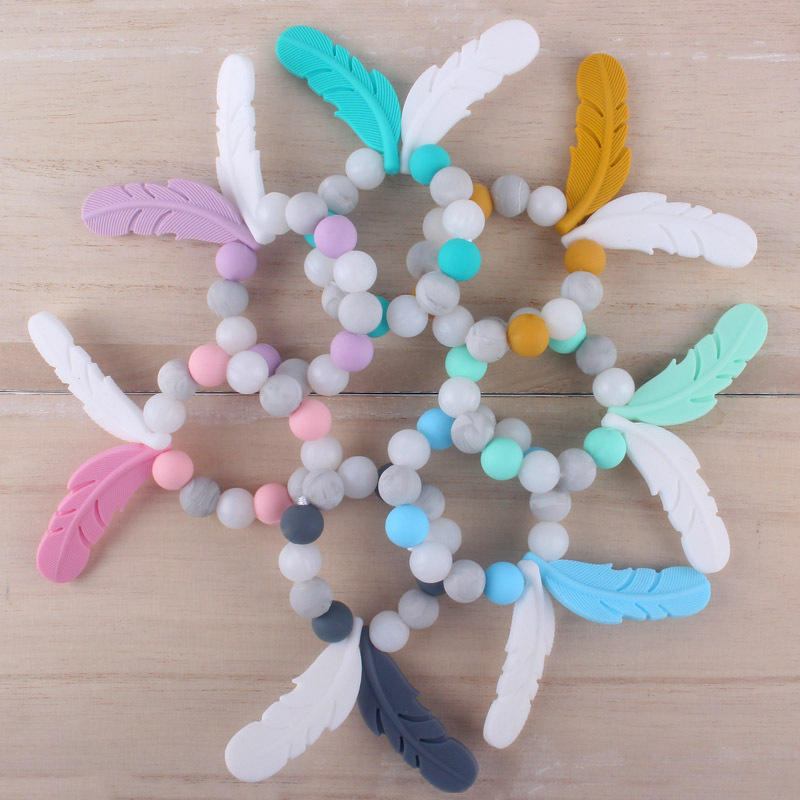 Productos para bebés de silicona chupete cadena mordedor pluma de dibujos animados de silicona juguete dientes molienda teether traje