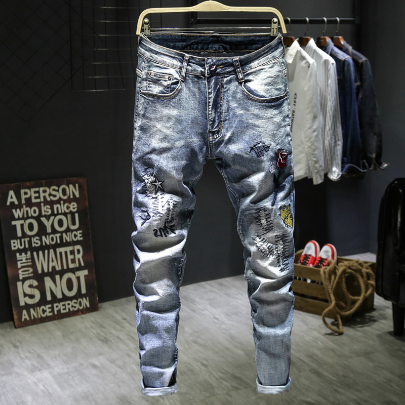 Europe and America Wear white Do the old hole Embroidery Flower Jeans Self cultivation Elastic force Pencil Pants trousers Popular men's wear
