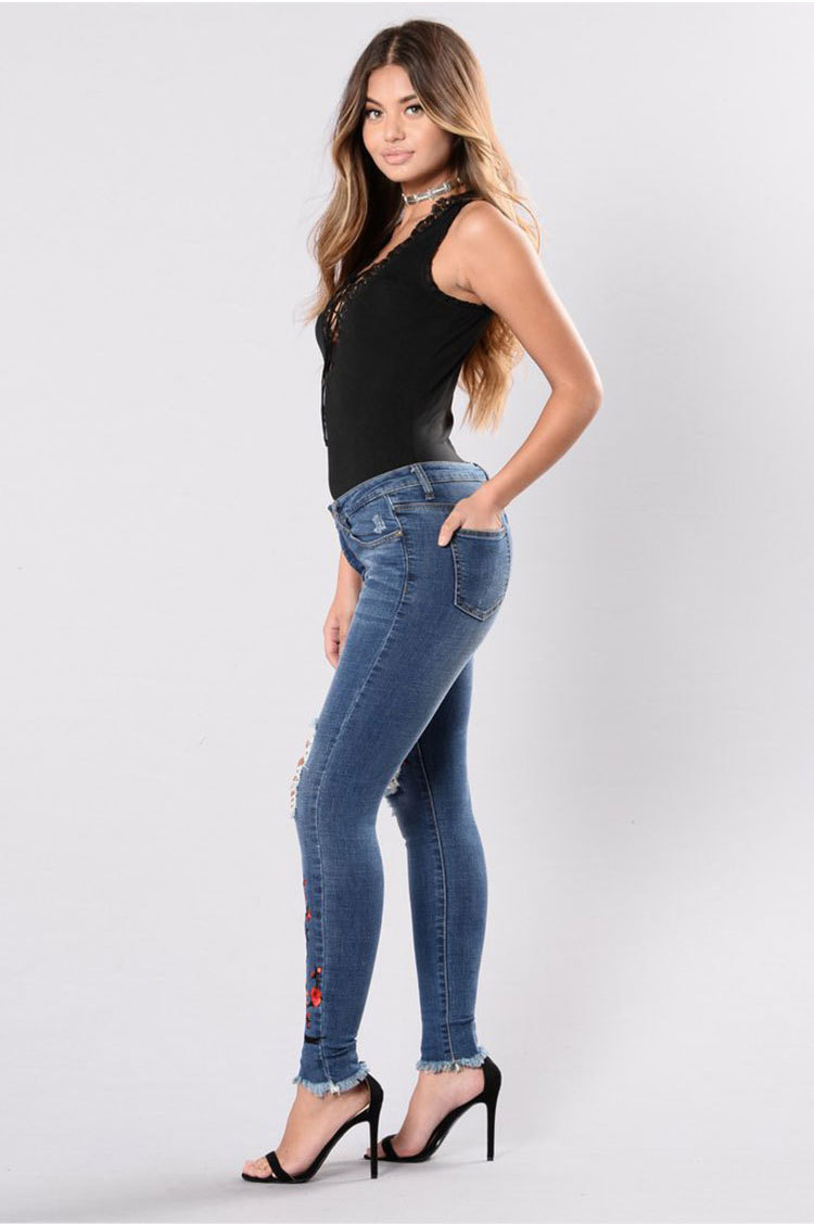 fashion hole embroidered high-elastic denim women s trousers nihaostyle clothing wholesale NSWL68441