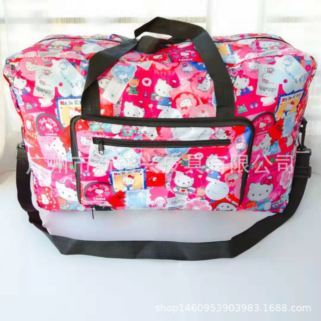 布丁犬玉桂犬美楽蒂k.t防水アニメ携帯折りたたみ旅行バッグはスーツケースに固定できます。