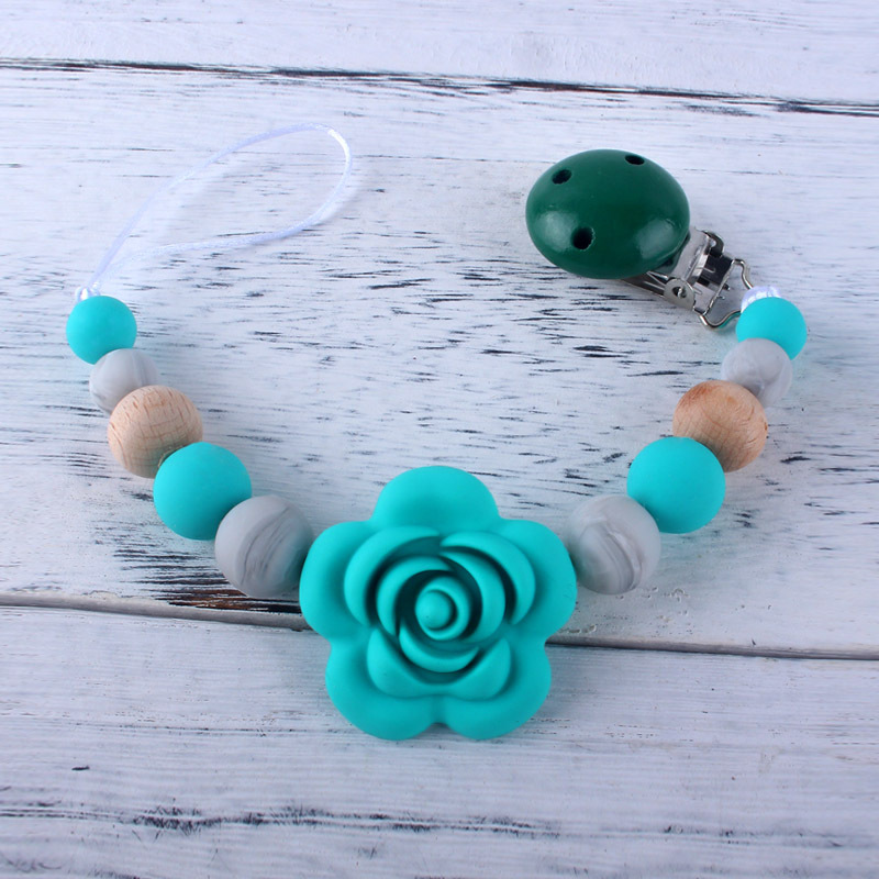 Cadena de chupete de silicona para bebés Amazon Cadena de molienda de dientes de bebés cadena anti-Caída de mordedor calmante personalizada por los fabricantes