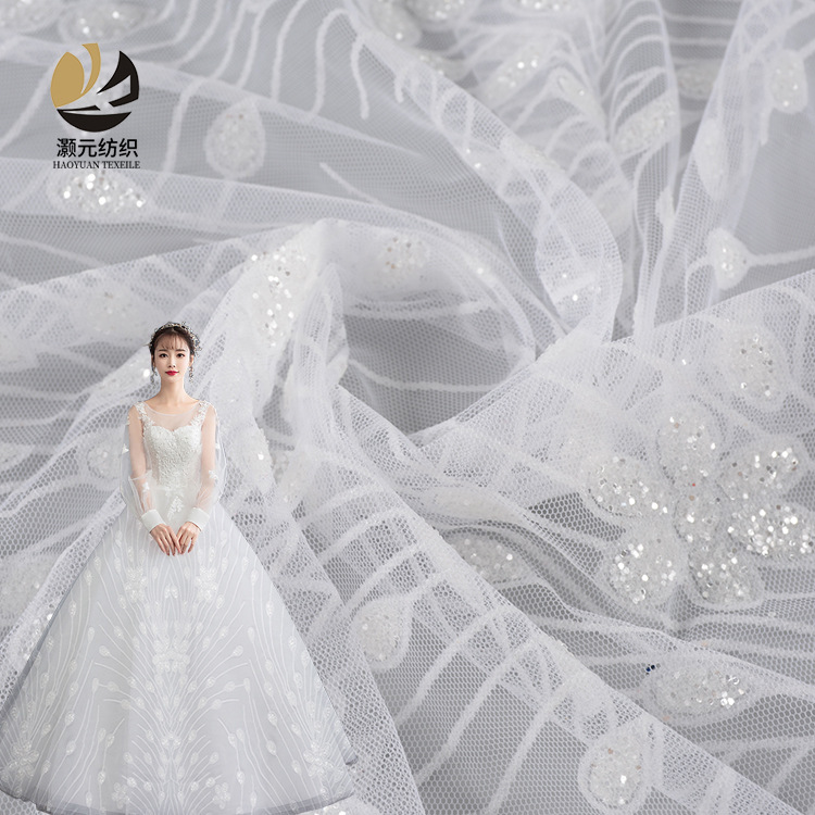 厂家供应 网纱亮片凤尾花网纱面料 头纱巾婚纱礼服面料