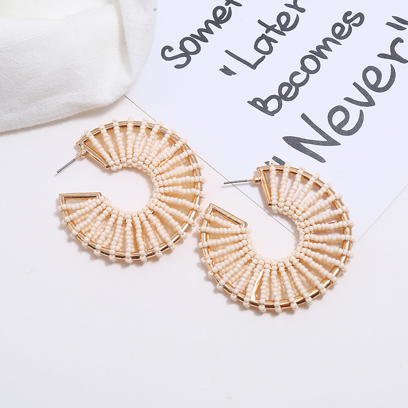 European And American Fashion Retro Fan-shaped Hollow Rice Beads Explosion Earrings display picture 7