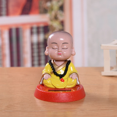 New Solar Cartoon Creative Waving Little Monk Car Ornament Waving Monk Car Decor Factory Direct Sale Gift