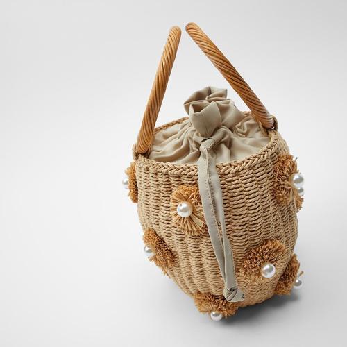 Manufacturer source artificial pearl decoration new straw woven bag trendy women's bag flower hand basket bag woven bag