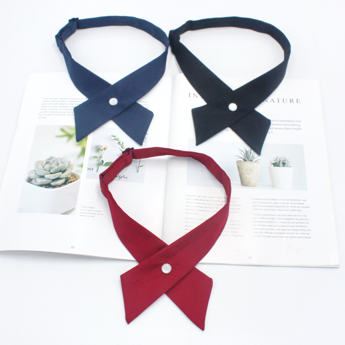 Spot al por mayor uniforme jk pajarita cruzada spot ropa de trabajo para mujer pajarita cruzada mate de color sólido 10 colores disponibles