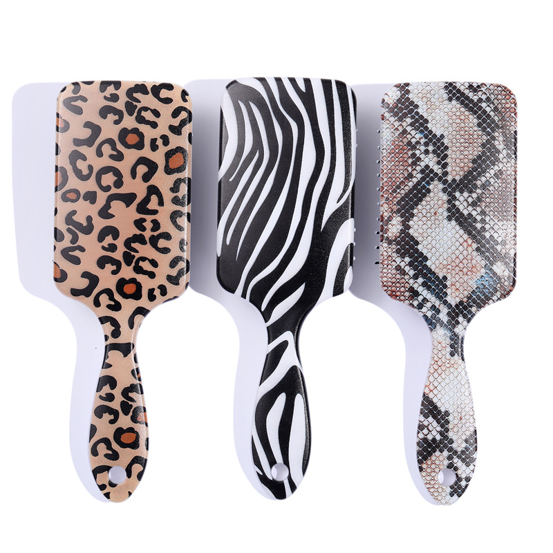 Fashion Geometric Flower Leopard Abs Hair Comb display picture 1