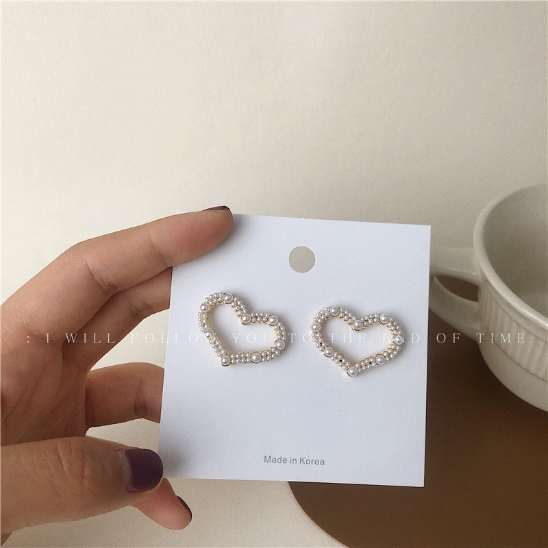 Korean S925 silver needle hollow heart sweet pearl earrings