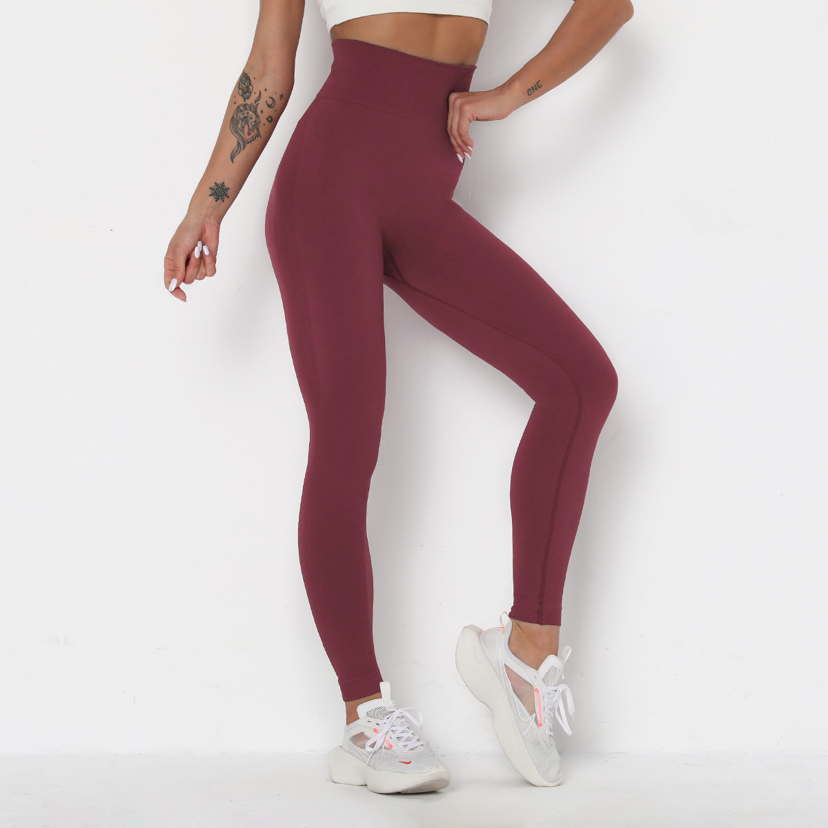 Pantalones de fitness ajustados de cintura alta de punto sin costuras NSLX9024