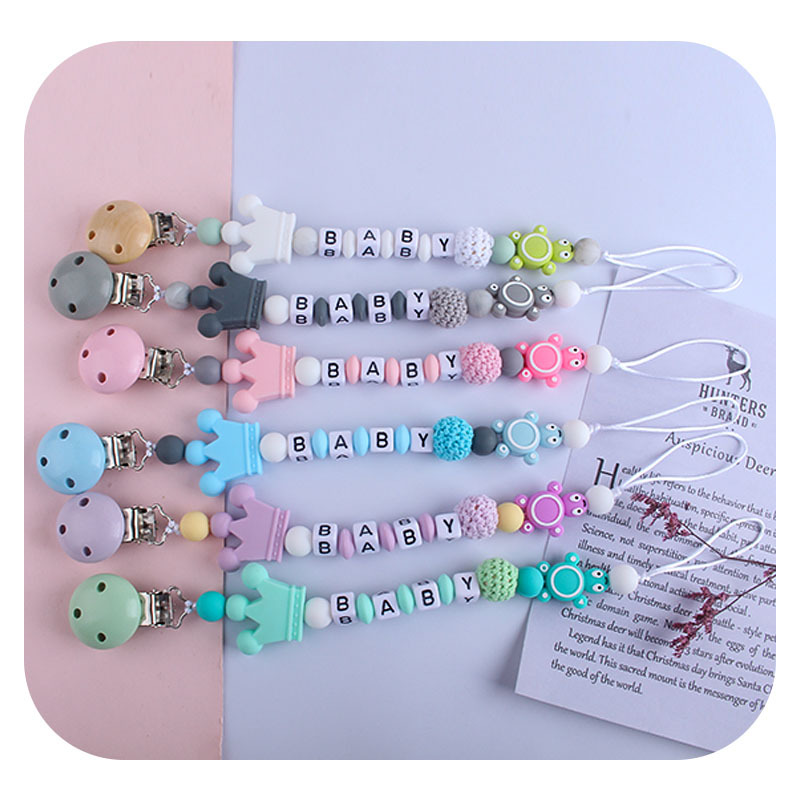 Bebé de plástico carta chupete clip bebé calmante corona de silicona tortuga mordedor chupete cadena anti-gota cadena