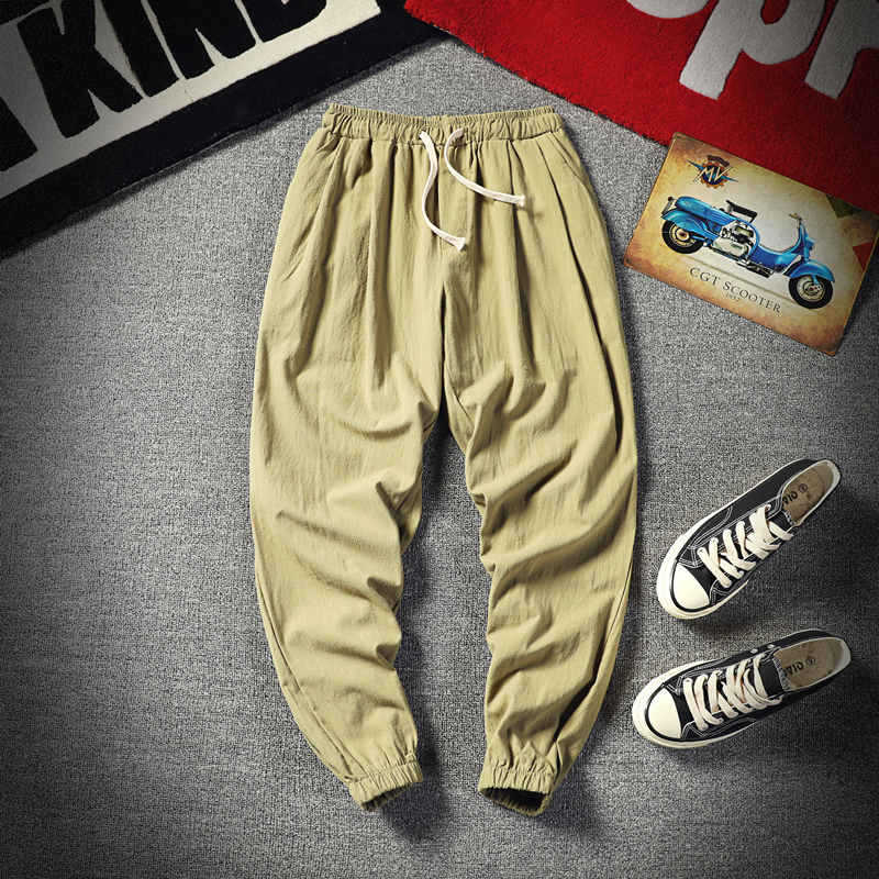 Pantalones cortos de los hombres recortados versátiles estilo coreano Pantalones deportivos de moda Pantalones de verano sueltos de los hombres pantalones atados al tobillo pantalones casuales pantalones de los hombres flacos