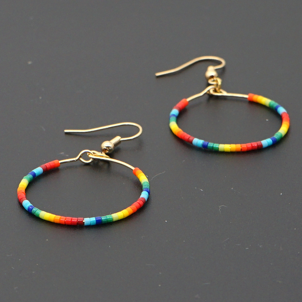 Fashion Exaggerated Rice Bead Woven Large Hoop Earrings display picture 9