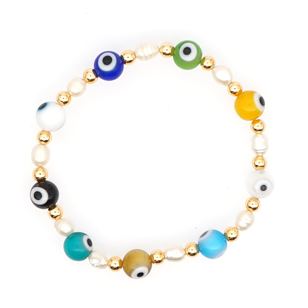 New Simple Baroque Pearl Glazed Evil Eye Ethnic Style Gold Bead Bracelet For Women Wholesale display picture 2