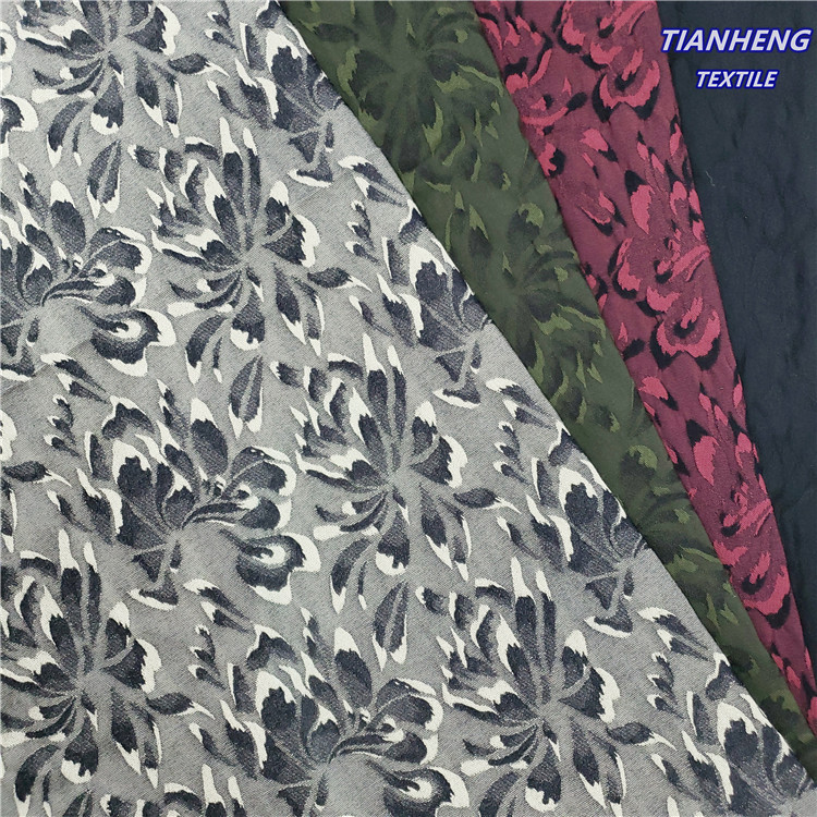 涤棉混纺罗缎蝴蝶提花 时尚男女装裤装西装外套箱包面料现货批发