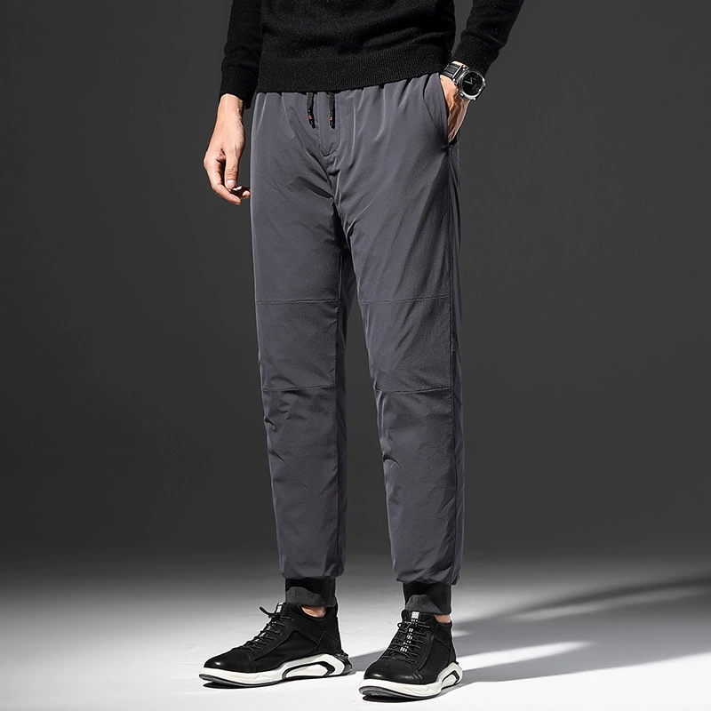 Трансграничные пуховые брюки, мужские зимние, новые корейские модные теплые мужские брюки, модный бренд в мужской досуг оптом