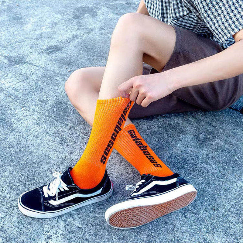 Unisex / Both men and women can trend letter in the tube socks