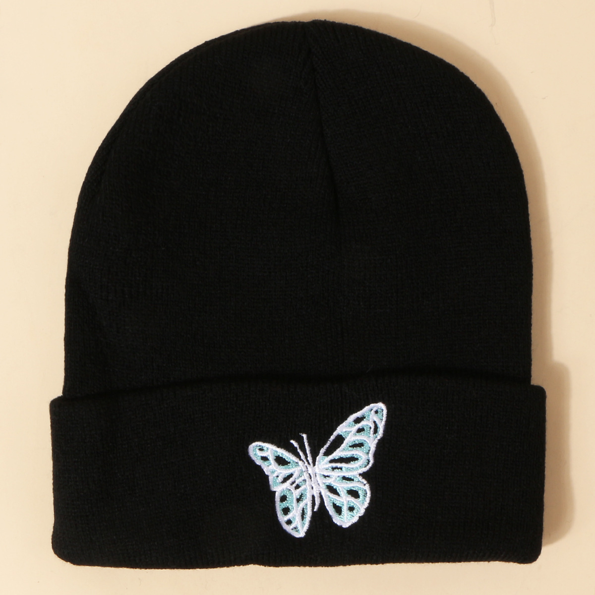 Hot Selling Fashion Pure Color Knitted Embroidery Butterfly Warm Woolen Hat Wholesale display picture 6