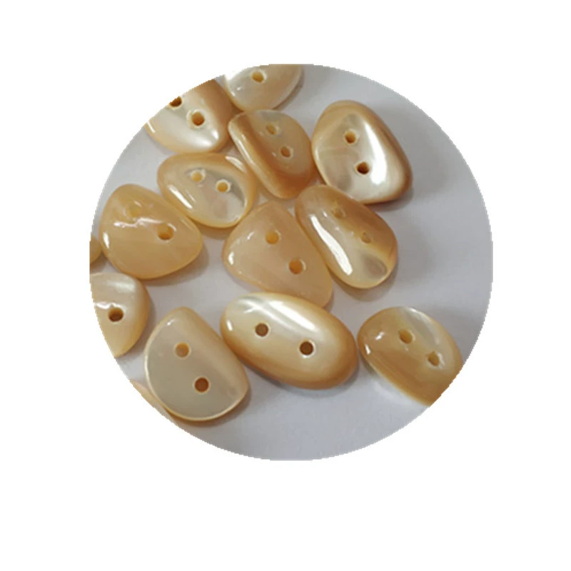 High -end natural alien shell button white shirt knit sweater irregular cobblestone oval shell button