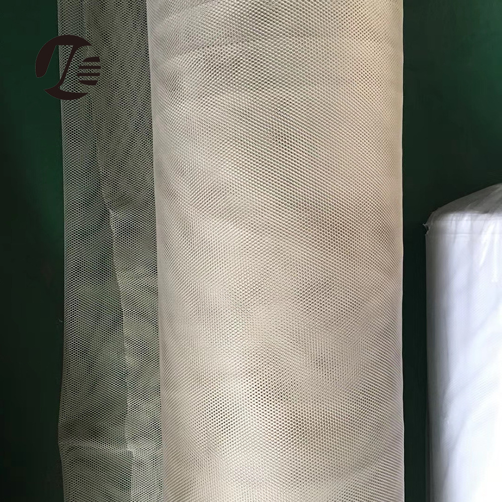 厂家直销大量现货米黄色六角网 处理六角网布 可做婴儿床护栏面料