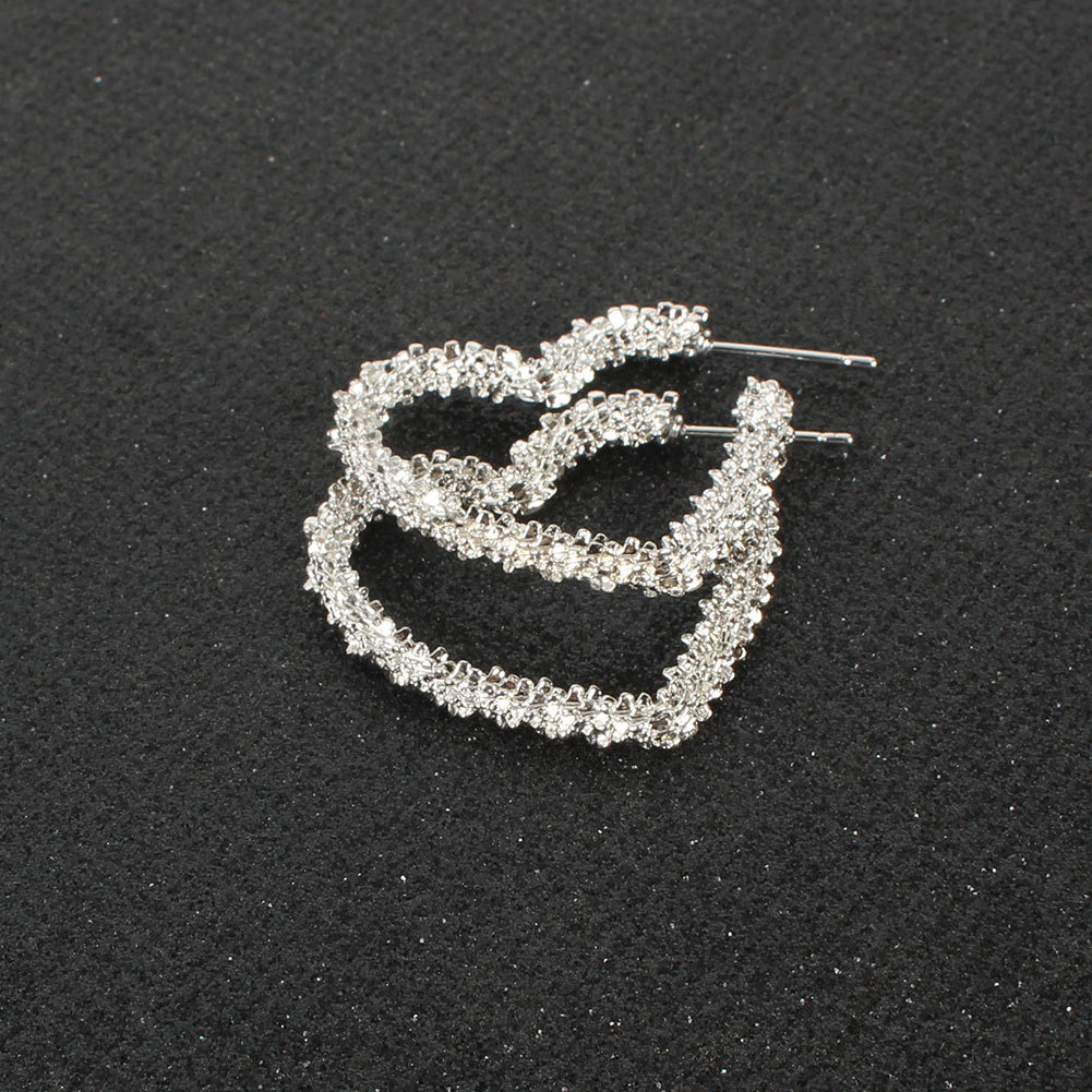 Fashion Bohemia Style Alloy Heart-shaped Hollow Earrings Wholesale display picture 6