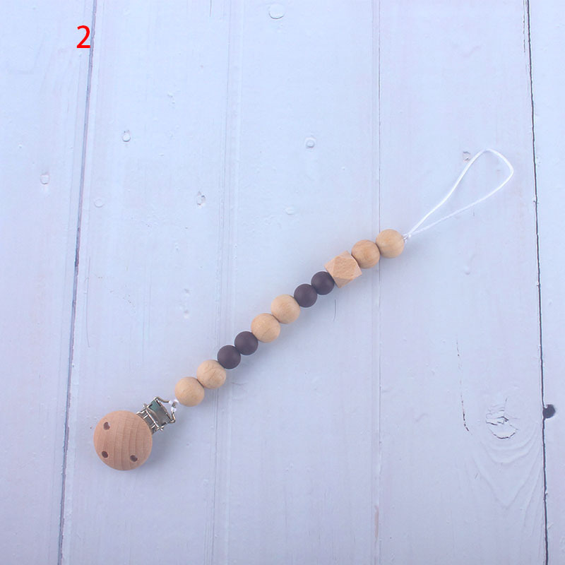 Nueva fábrica directa bebé Beech juguete mordedor bebé chupete de silicona pezón anti-gota cadena materna y infantil suministros