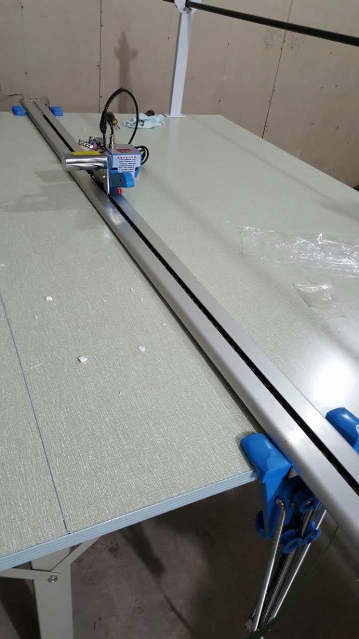 断布机  省布机  缝纫设备  工业用缝纫机自动断布平缝机绷缝机