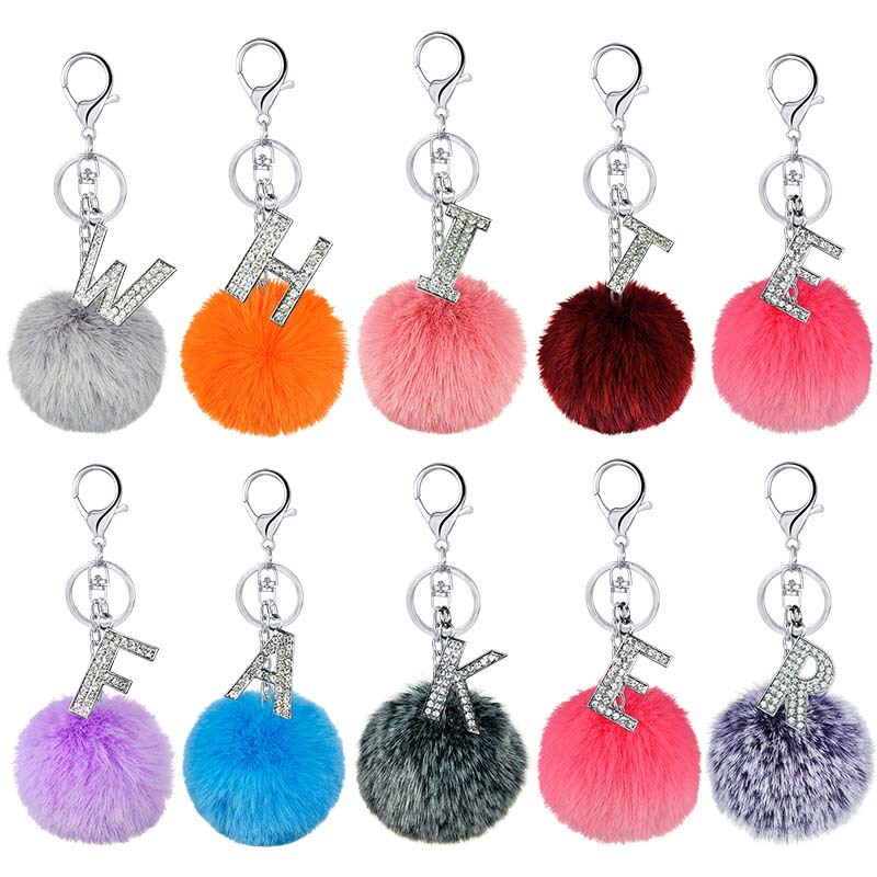 Cross-border hot 26-color imitation Rex rabbit fur ball diamond alloy English letter keychain pendant bag accessories jewelry