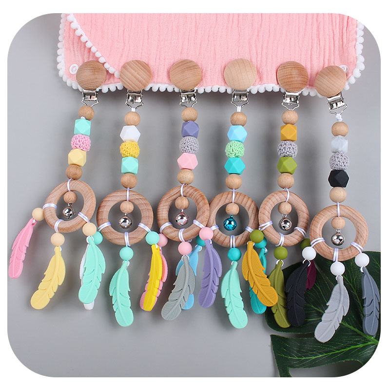Bebé DIY creativo Beech anillo de juguete mordedor de dibujos animados pluma de silicona teether palo Pezón cadena anti-caída de la cadena Nuevo