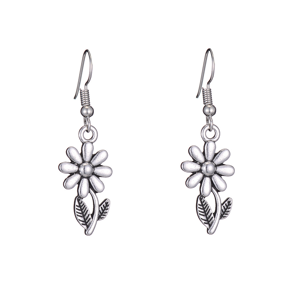 New Retro Alloy Footprint Ballet Bone Flower Earrings Wholesale display picture 8