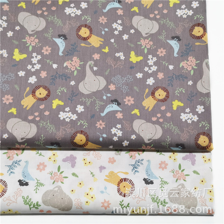 浅咖底卡通动物狮子大象 纯棉斜纹布料 全棉印花床品睡衣棉服面料