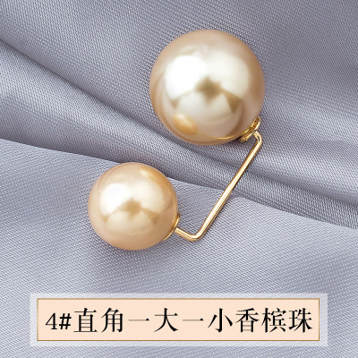 #4Rectangular champagne beads, one large and one small