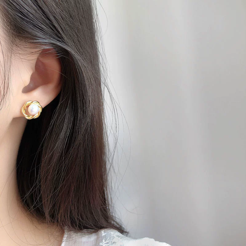 Sophisticated small earrings from pearl, silver 925 sample