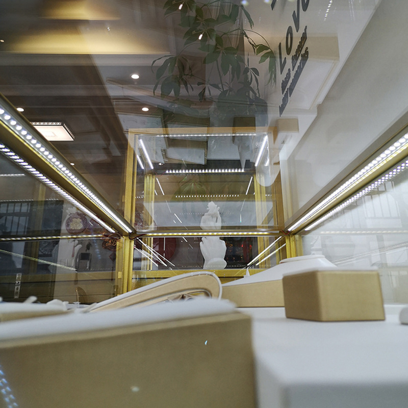 商超眼镜手表玻璃设计珠宝首饰展示柜古玩玉器陈列展柜	眼镜展柜