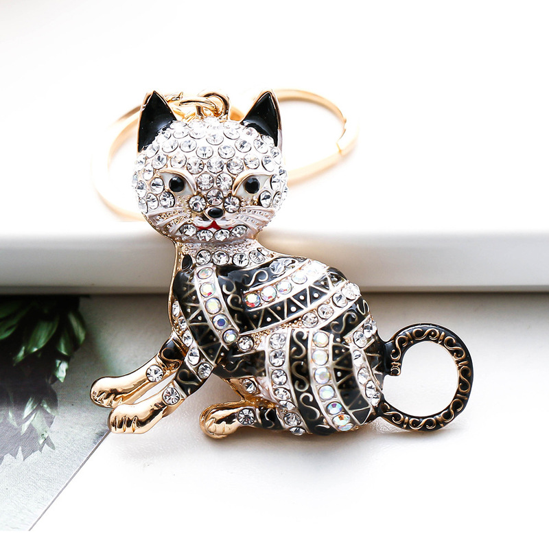 The new color set auger cartoon cat creative metal key chain pendant auto accessories manufacturer straight for a small gift