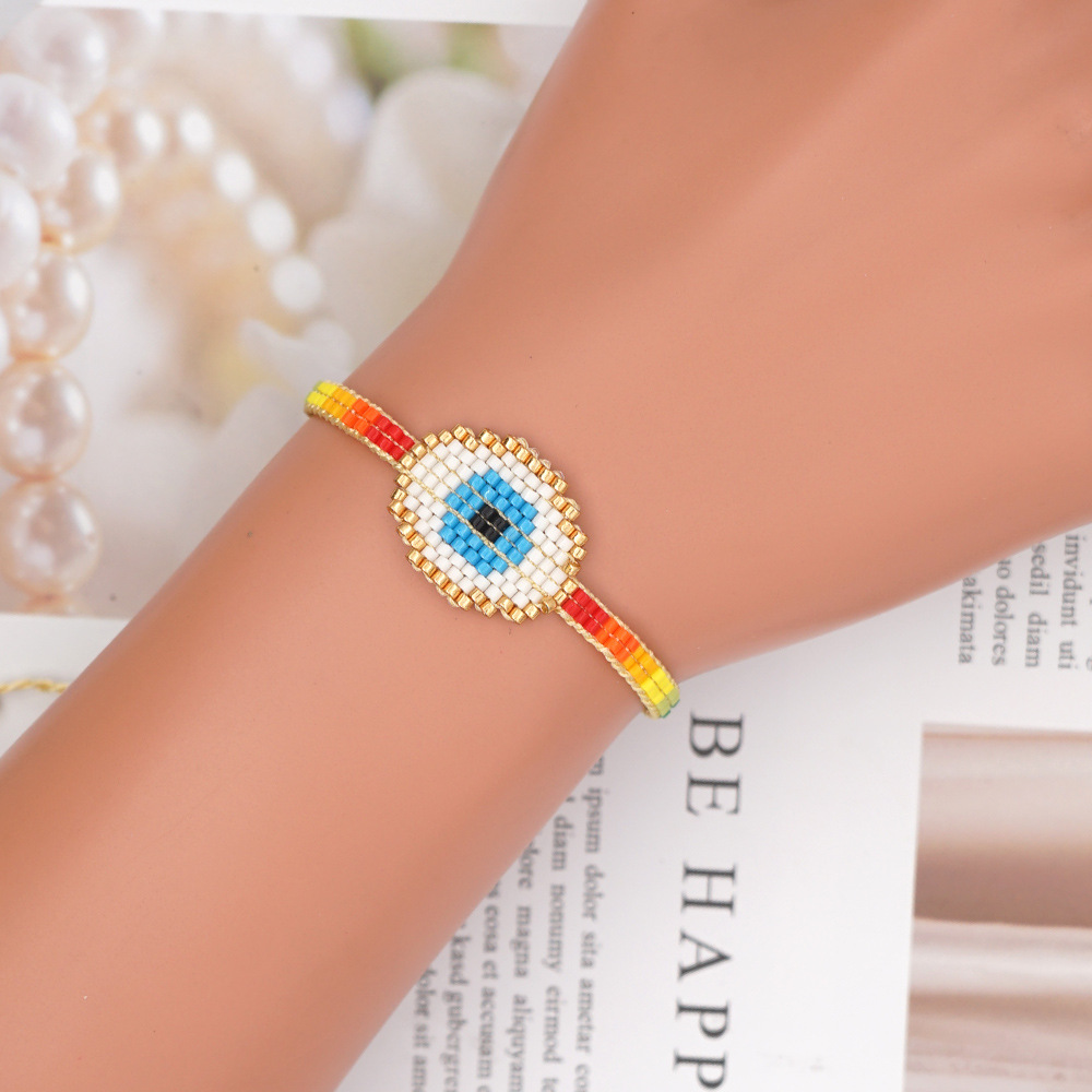 Pulsera Étnica Bohemia De Ojos Azules Turcos Tejida A Mano Con Arcoíris display picture 1