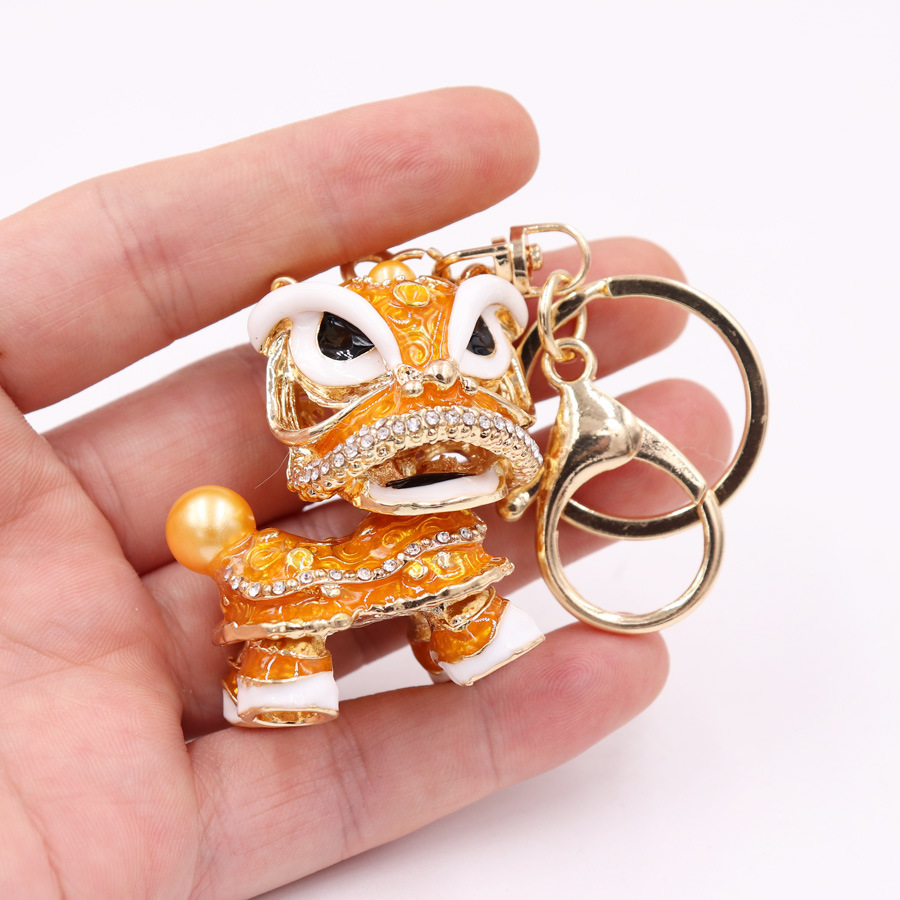 Estilo chino regalo creativo grande Kirin colgante 5*4,5 cm aleación danza León llavero adornos al por mayor